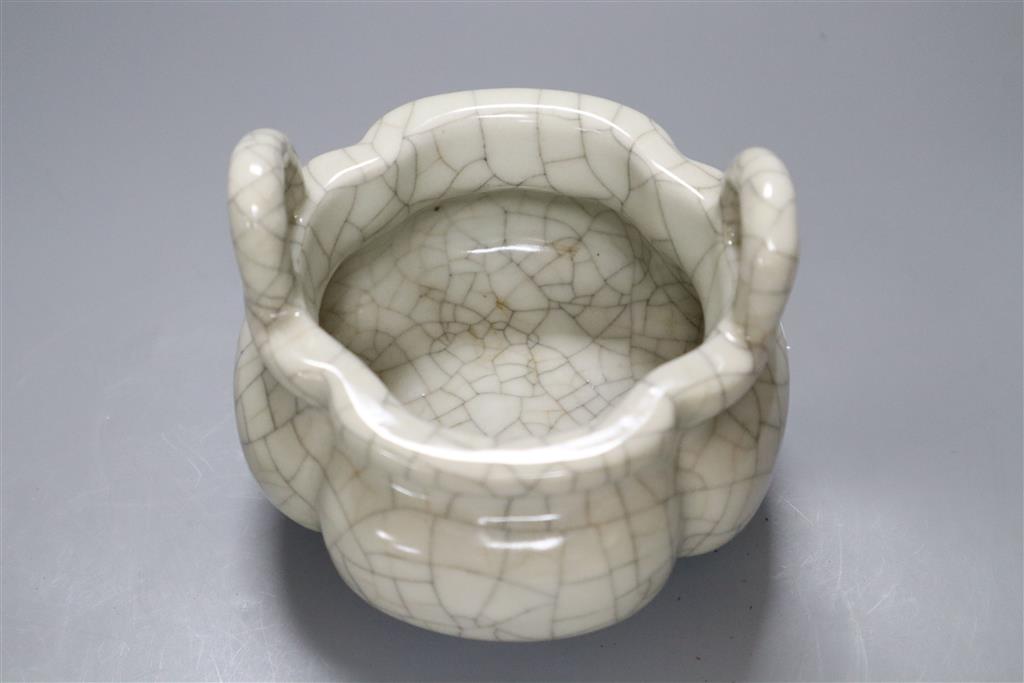 A Chinese crackle glaze tripod censer, Qianlong mark, diameter 13cm